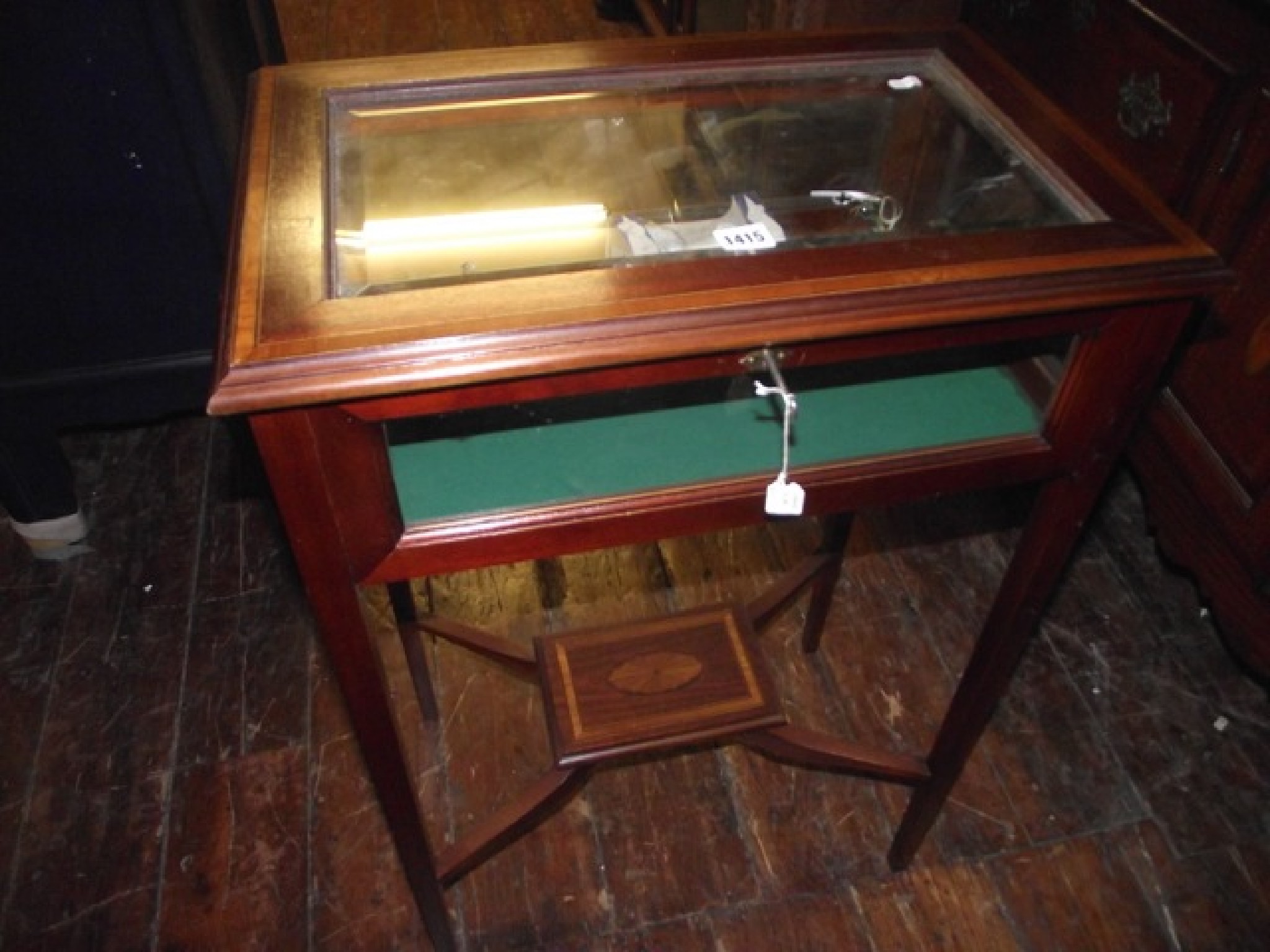 Appraisal: A Victorian mahogany vitrine crossbanded in satinwood with boxwood and