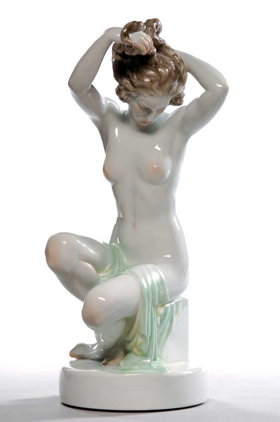 Appraisal: HEREND SCULPTURE OF A BATHING WOMAN Large Hungarian porcelain sculpture