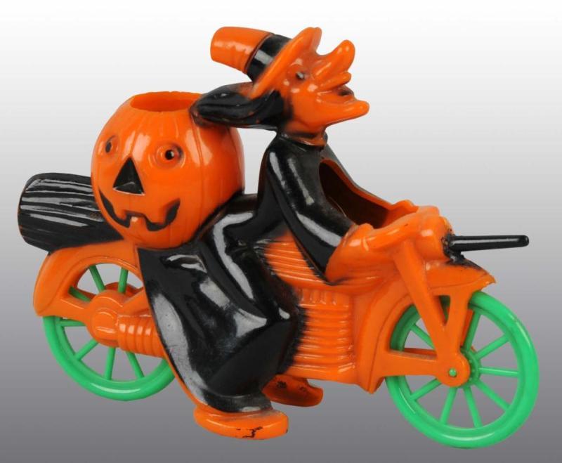 Appraisal: Plastic Witch on Motorcycle Halloween Piece Description Complete Condition Excellent