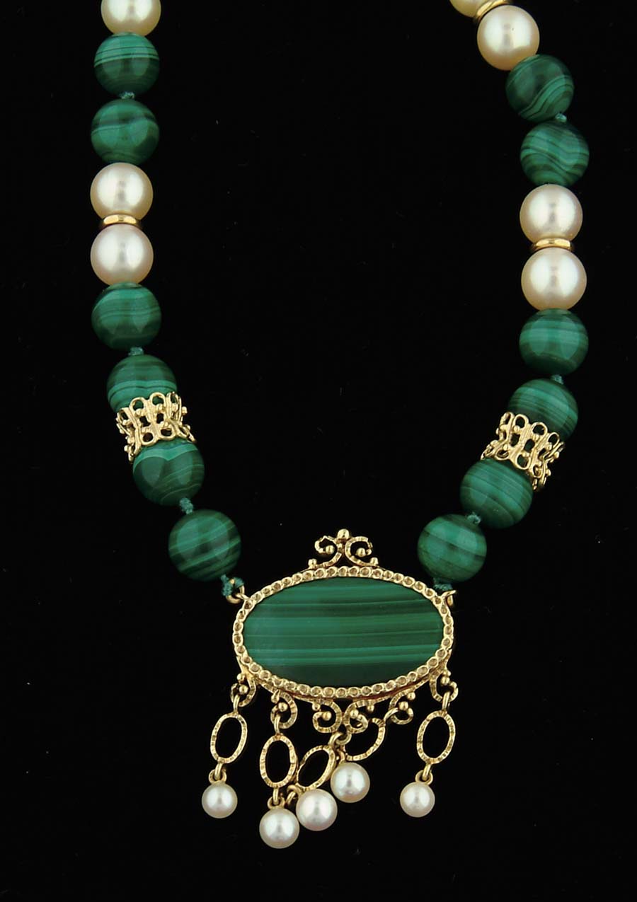 Appraisal: MALACHITE AND PEARL NECKLACE Forty mm malachite beads and twelve