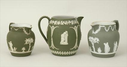 Appraisal: Three Wedgwood Green Jasperware Pitchers Marked to in