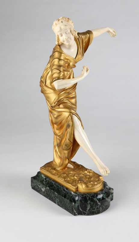 Appraisal: After Paul Philippe gilt bronze and ivory figure of a