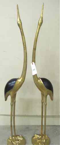 Appraisal: A PAIR OF BRASS WILDLIFE SCULPTURES a pair of cranes