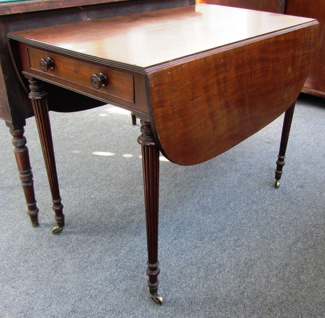 Appraisal: A late George III mahogany Pembroke table on tapering reeded