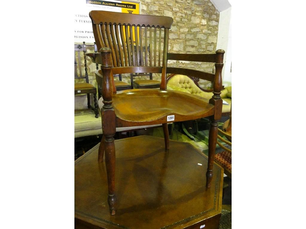 Appraisal: A late Victorian mahogany elbow chair in the Godwin style