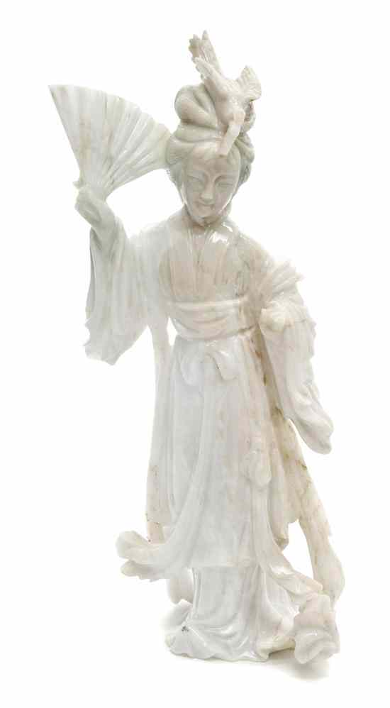 Appraisal: A Chinese Jadeite Carving of a Beauty the figure depicted