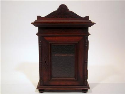 Appraisal: English carved mahogany hanging cupboard late th century