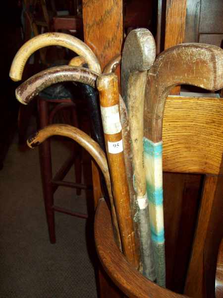 Appraisal: A GROUP OF EIGHT ASSORTED WALKING STICK AND HOCKEY STICKS