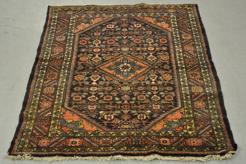 Appraisal: - Hamadan oriental throw mat with center rosette x -