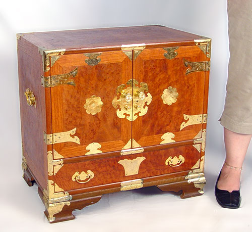 Appraisal: BRASS MOUNTED ORIENTAL BURLWOOD CABINET One full length drawer under