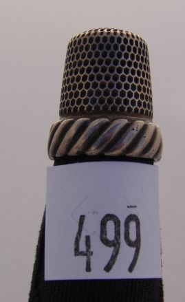 Appraisal: Simons sterling thimble with cartouche on decorated band