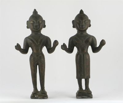 Appraisal: A pair of Indian bronze standing figures of a man