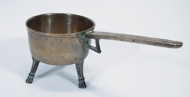 Appraisal: Oriental bronze cooking pot on three feet cm in length