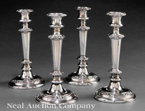 Appraisal: A Set of Four Sheffield Candlesticks tapering cylindrical bodies with