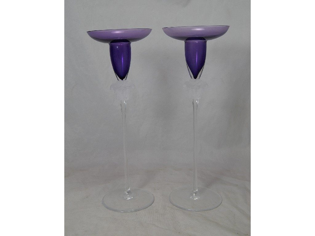 Appraisal: A pair of Rosenthal Versace glass candlesticks with lilac bowls