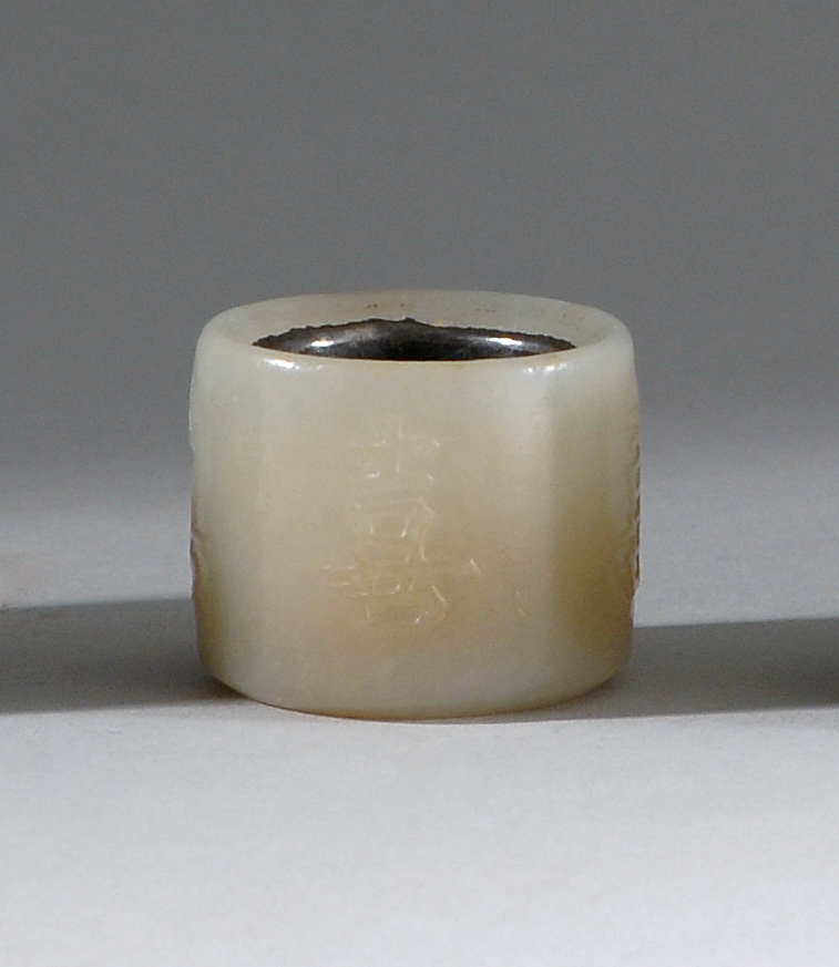 Appraisal: WHITE JADE SCHOLAR'S RING Early th CenturyIn cylinder form with