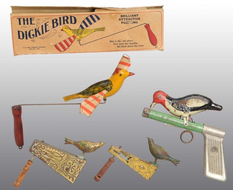 Appraisal: Lot of Handheld Bird Toys Description American Includes three handheld