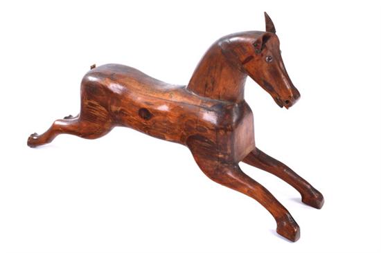 Appraisal: AMERICAN FOLK ART CARVED PINE GALLOPING HORSE Early th century