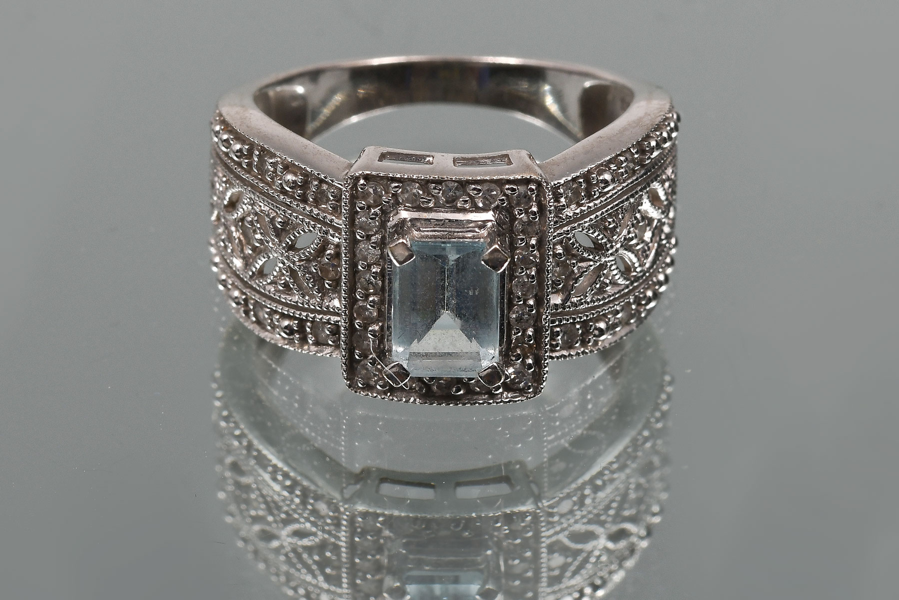 Appraisal: K TOPAZ DIAMOND RING K white gold ring contains one