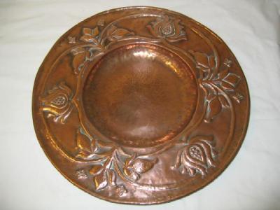 Appraisal: TWO SIMILAR ARTS AND CRAFTS COPPER PLAQUES of circular form