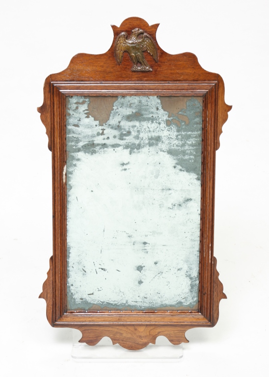 Appraisal: AMERICAN CHIPPENDALE SCROLL MIRROR Ca mahogany and pine Eagle on