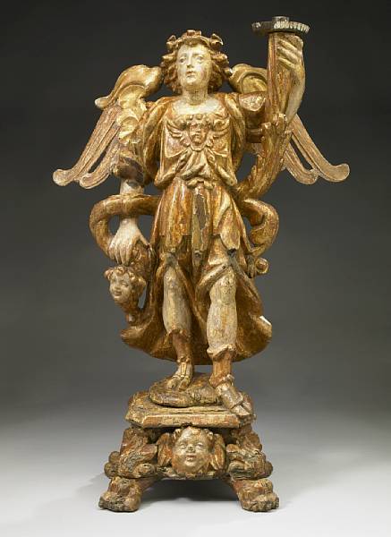 Appraisal: An Italian Renaissance painted and parcel gilt angel form torchere