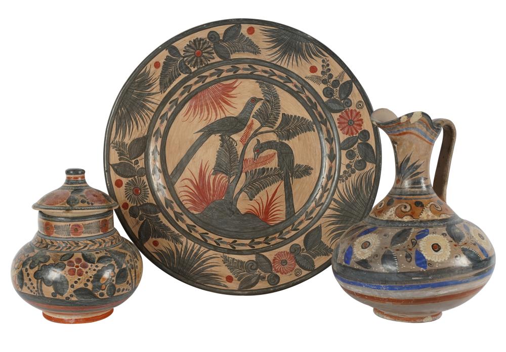 Appraisal: THREE MEXICAN POTTERY VESSELSeach hand-painted comprising a charger inscribed Mexico