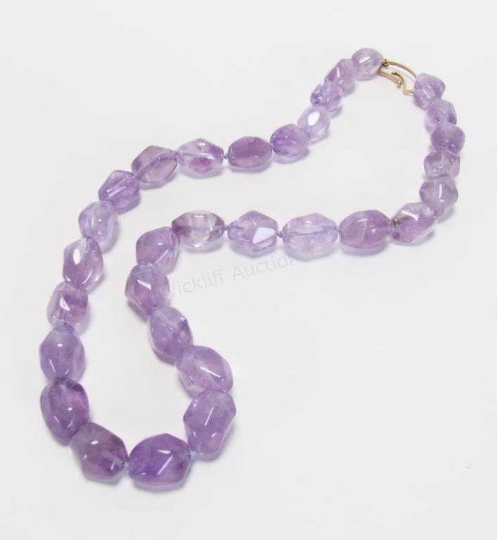 Appraisal: An amethyst necklace with thirty-one amethyst nuggets varying in size