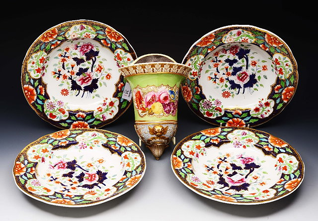 Appraisal: A SET OF FOUR VICTORIAN IRONSTONE SOUP PLATES with polychrome