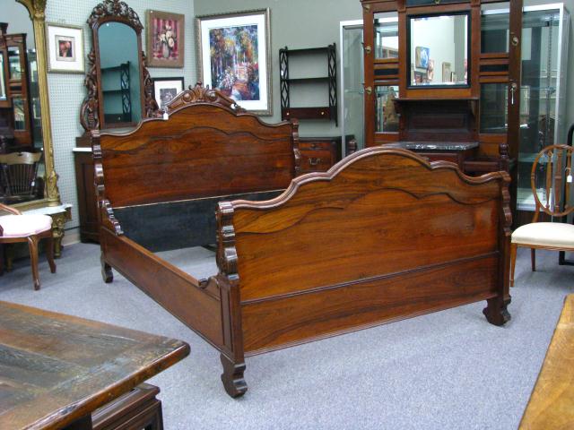 Appraisal: Vintage Rosewood Queen Size Bed with carved headboard and rosewood