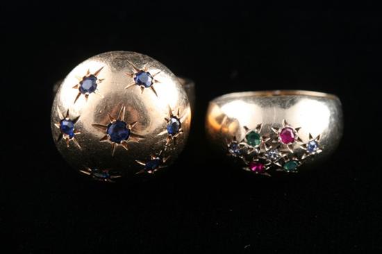 Appraisal: TWO K YELLOW GOLD AND GEMSTONE DOME RINGS One low