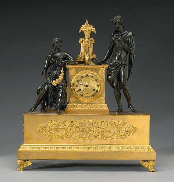 Appraisal: An Empire gilt and patinated bronze mantel clock early th