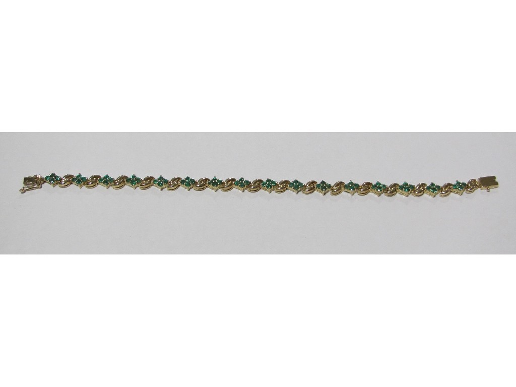 Appraisal: Fourteen carat gold emerald set bracelet with clusters of four