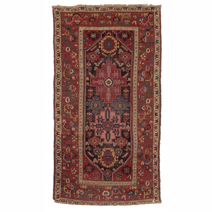 Appraisal: Persian Kurdish rug c stylized floral design with a red