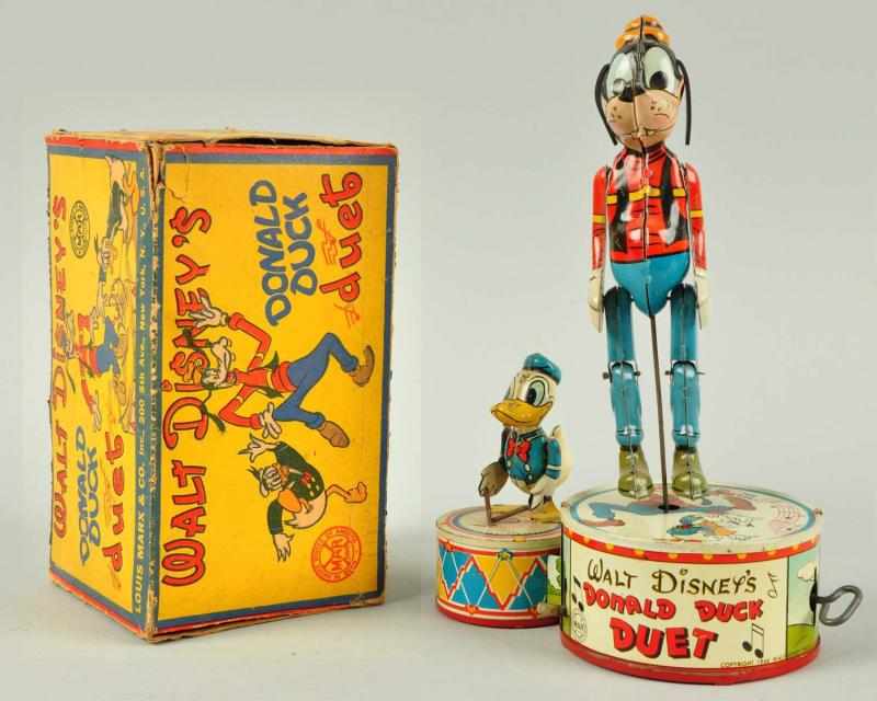 Appraisal: Tin Marx Disney Donald Duck Duet Wind-Up Toy Description American