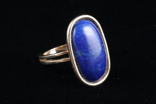 Appraisal: K YELLOW GOLD AND LAPIS LAZULI RING Oblong lapis cabochon