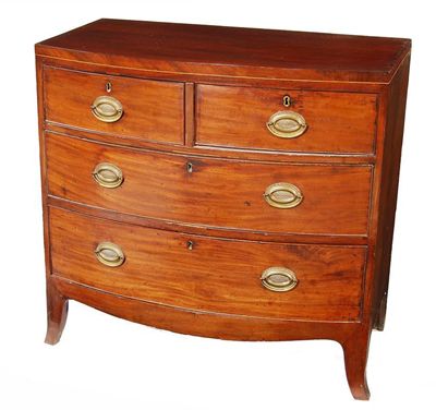 Appraisal: An early th century mahogany bowfront chest of two short