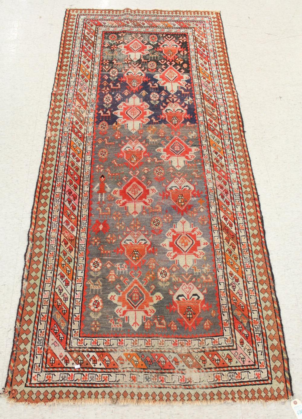 Appraisal: ANTIQUE PERSIAN TRIBAL AREA RUG featuring a field of geometric