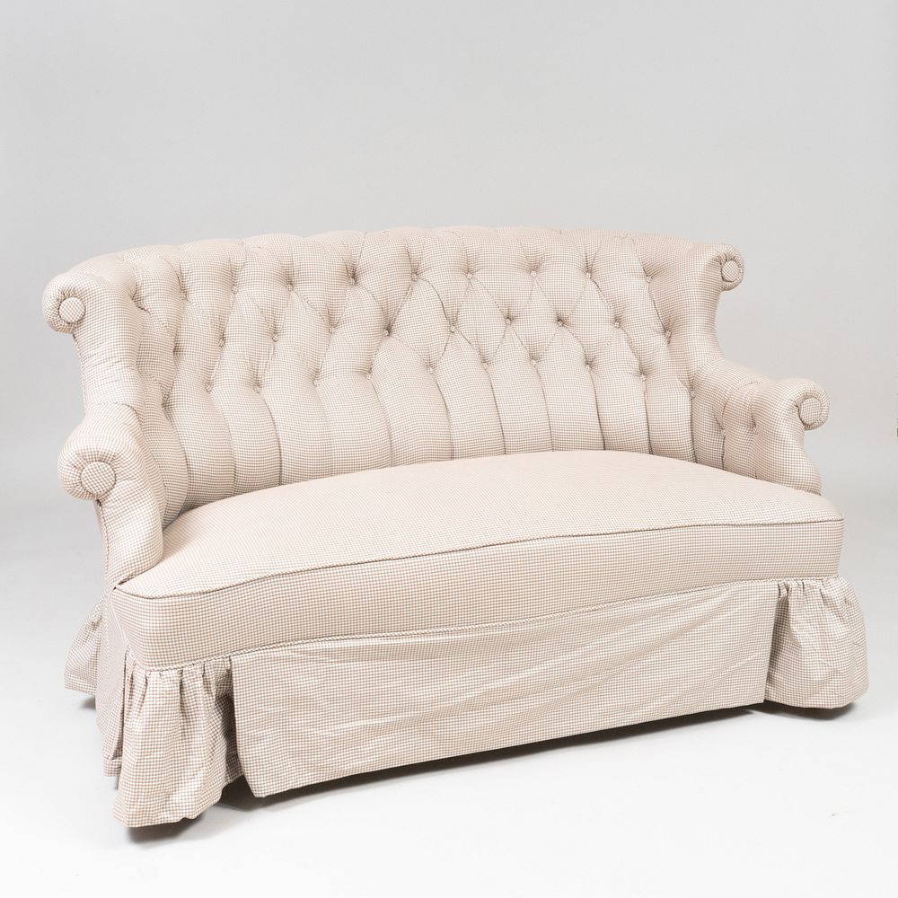 Appraisal: Victorian Style Tufted Cotton Upholstered Skirted Sofa Raised on wooden