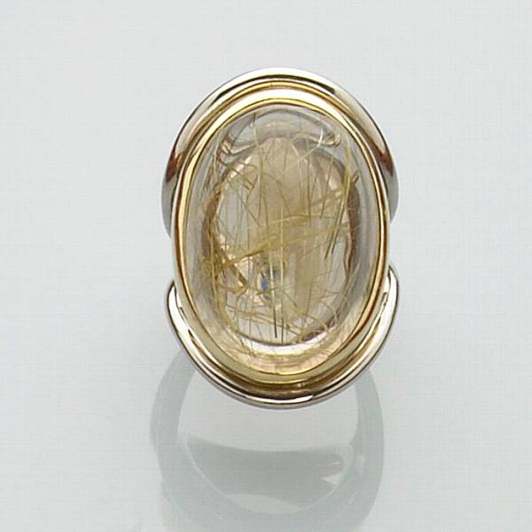 Appraisal: Rutilated Quartz Ring A fine quality cabochon rutilated quartz is