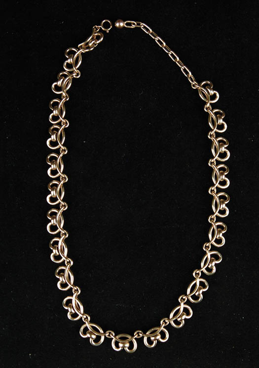 Appraisal: K PRETZEL LINK YELLOW GOLD NECKLACE Twenty-three links Marked on