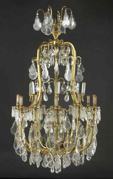 Appraisal: Louis XV style dore bronze chandelier of cageform with twelve