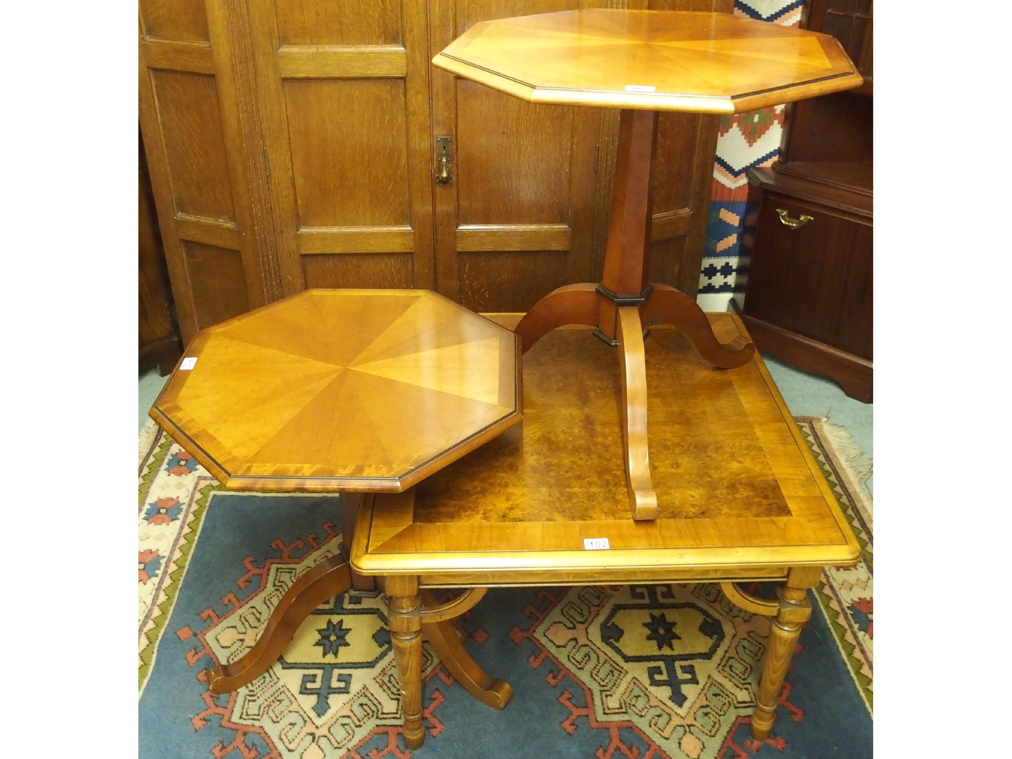 Appraisal: Two octagonal occasional tables and a square walnut coffee table