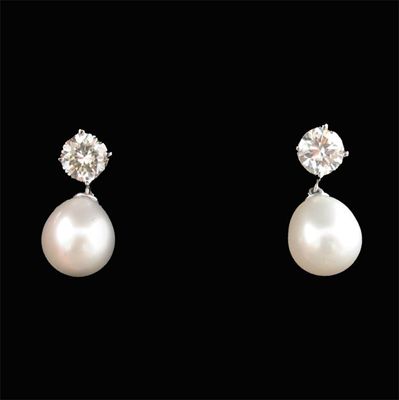 Appraisal: A pair of diamond and cultured pearl drop earrings the