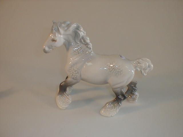 Appraisal: A Beswick cantering shire rocking horse grey model designed by