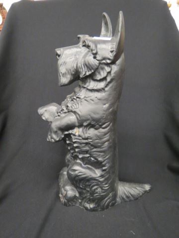 Appraisal: Cast Figural Doorstop of a Scotty begging