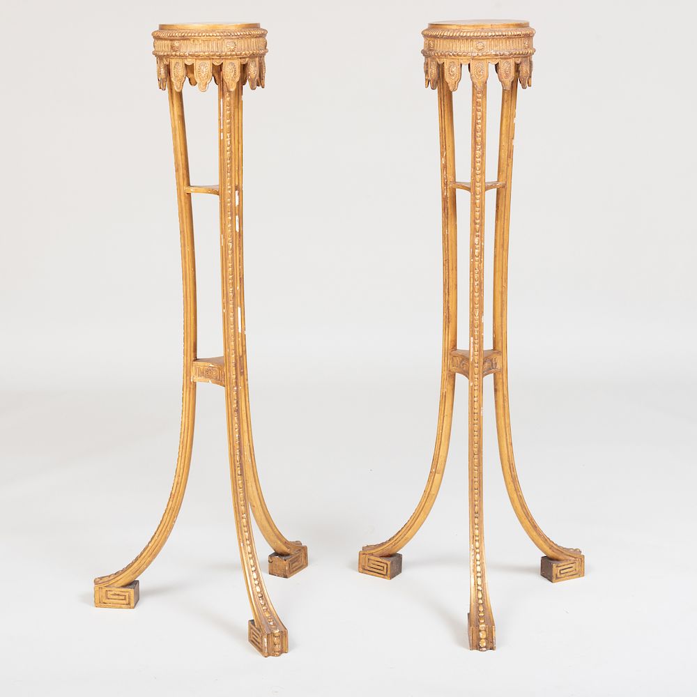 Appraisal: Pair of George III Style Giltwood Tripod Torch res Pair