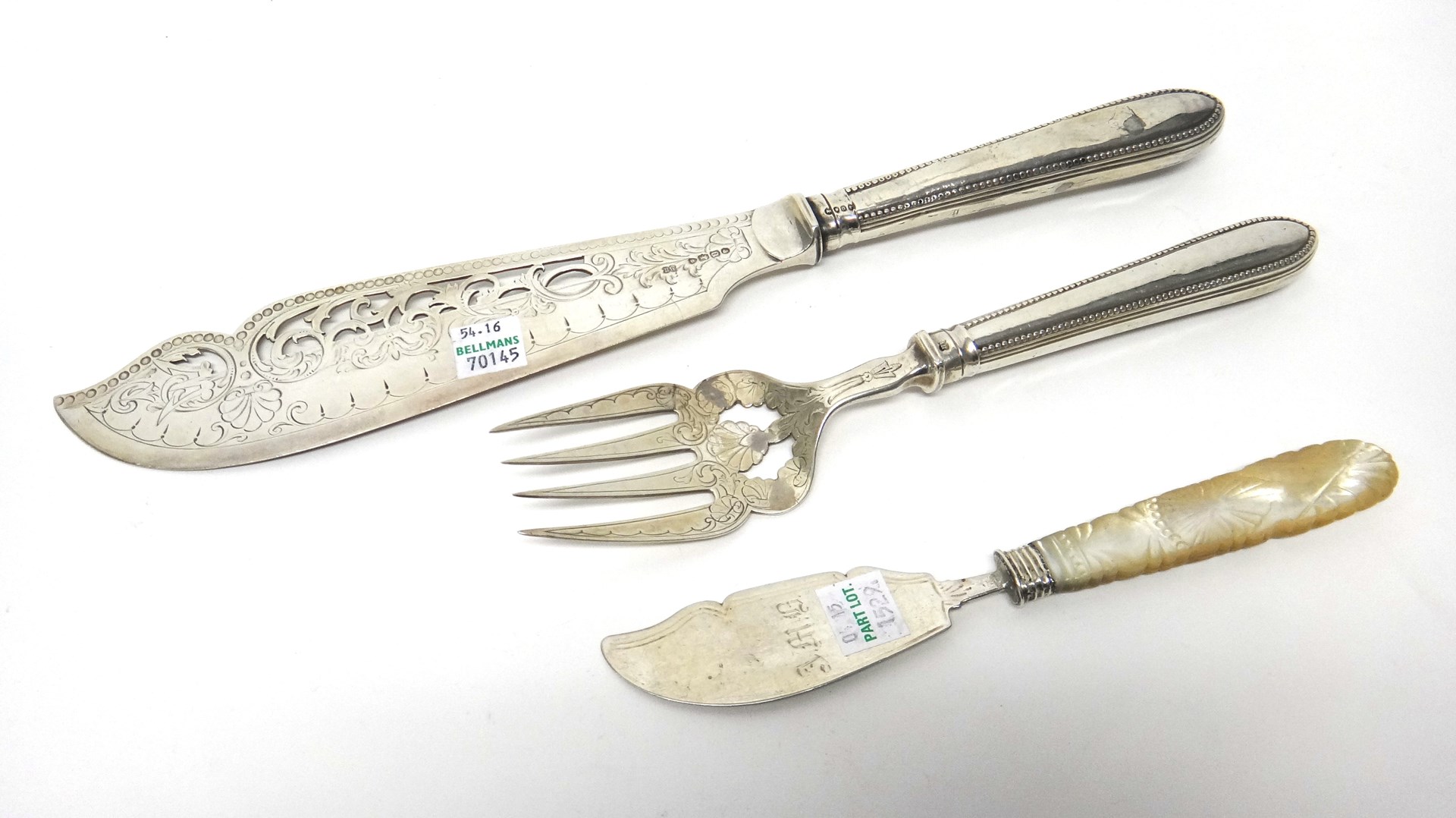 Appraisal: A pair of Victorian silver fish servers with pierced and