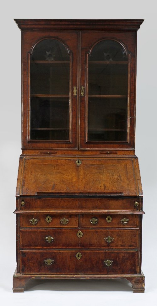 Appraisal: An early th Century walnut bureau bookcase circa with moulded