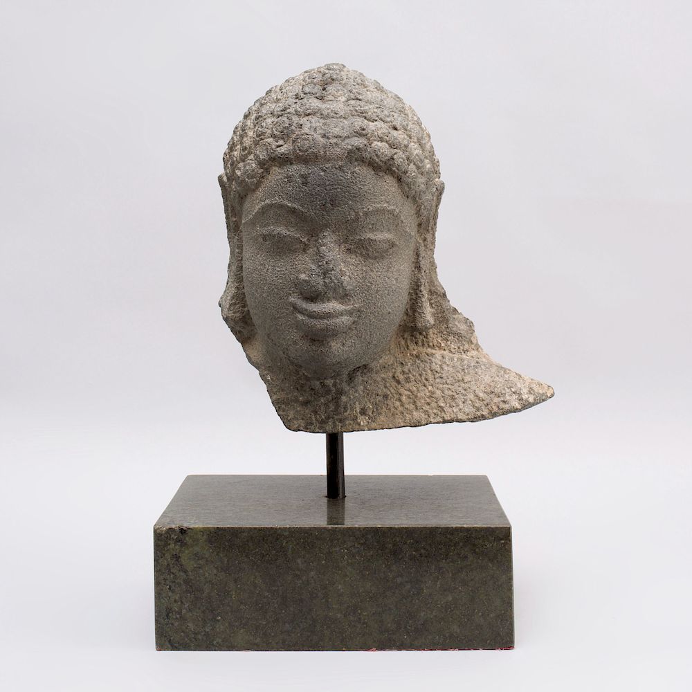 Appraisal: Indian Carved Grey Schist Fragmentary Head of Jina Now raised